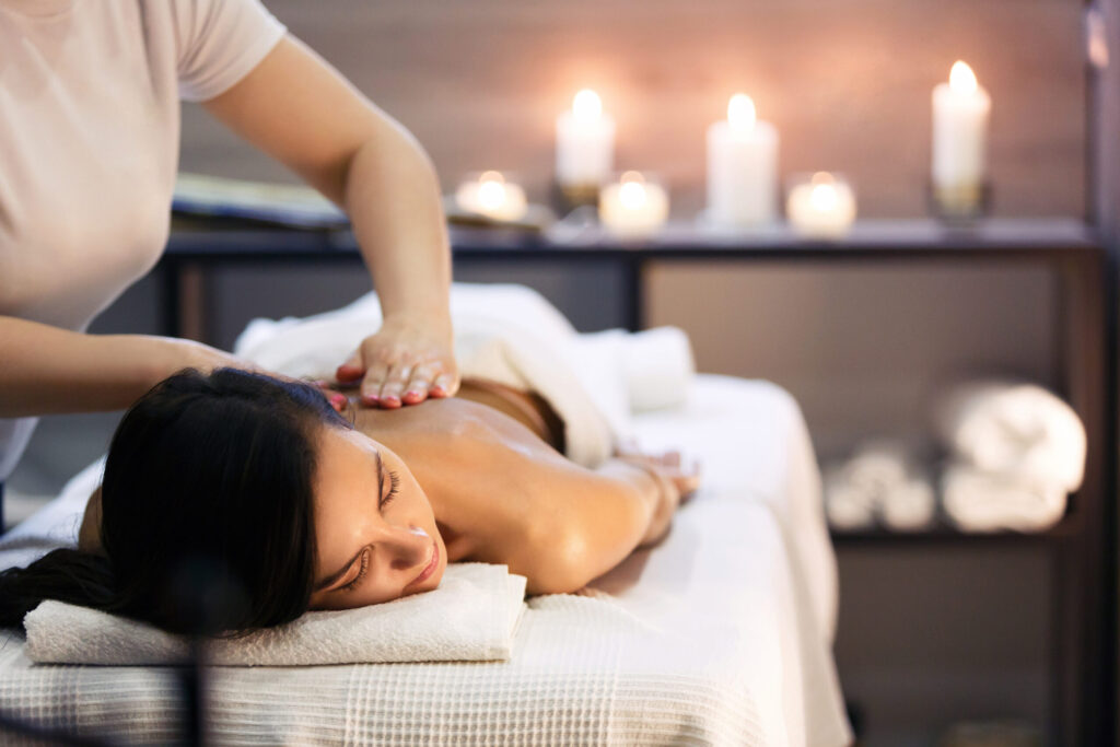 Woman receiving a massage at a spa