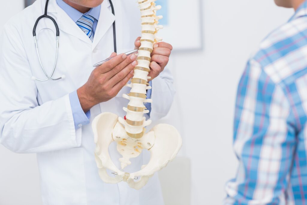 spine doctor consulting with patient